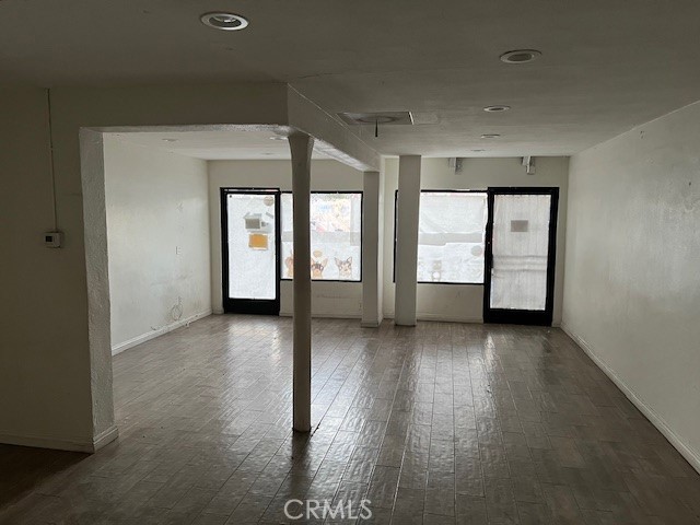504 S Harbor Fullerton, CA 92832 - Photo 4 of 18 wooden floor in an empty room with a window