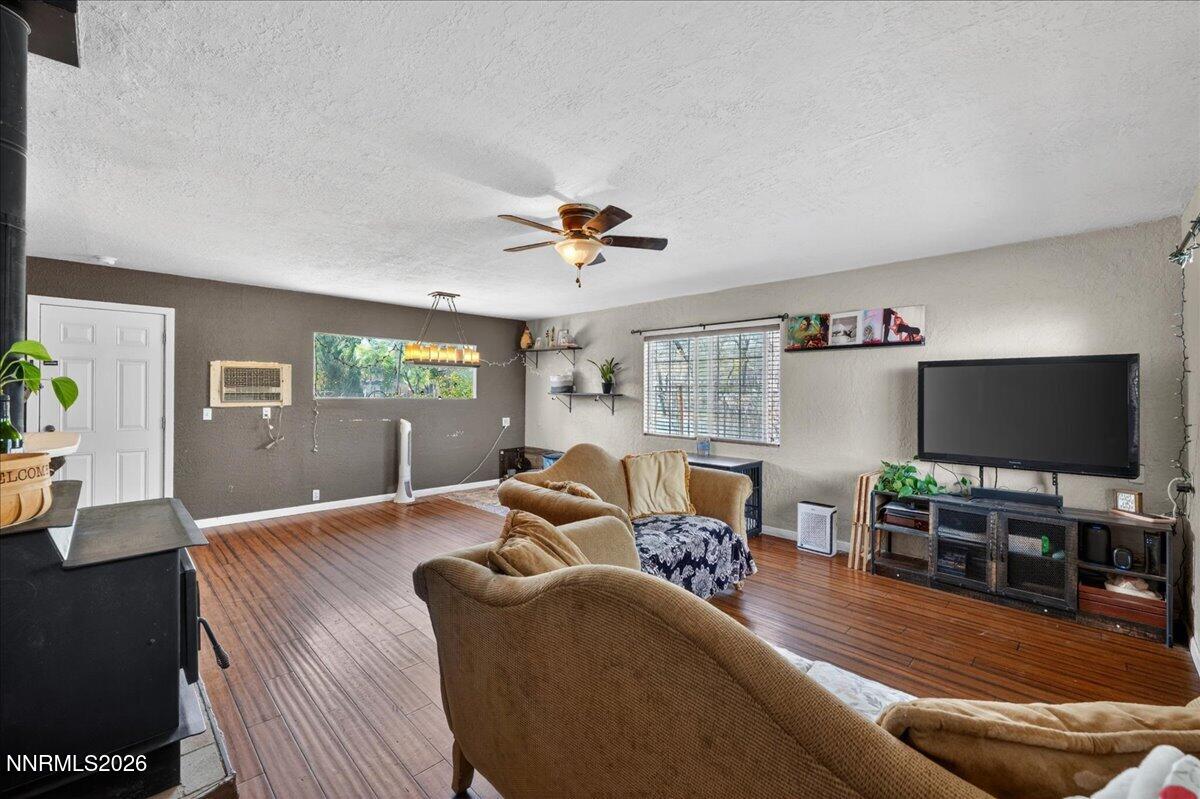 270 Vine Street Fernley, NV 89408 - Photo 15 of 28 a living room with furniture and a flat screen tv