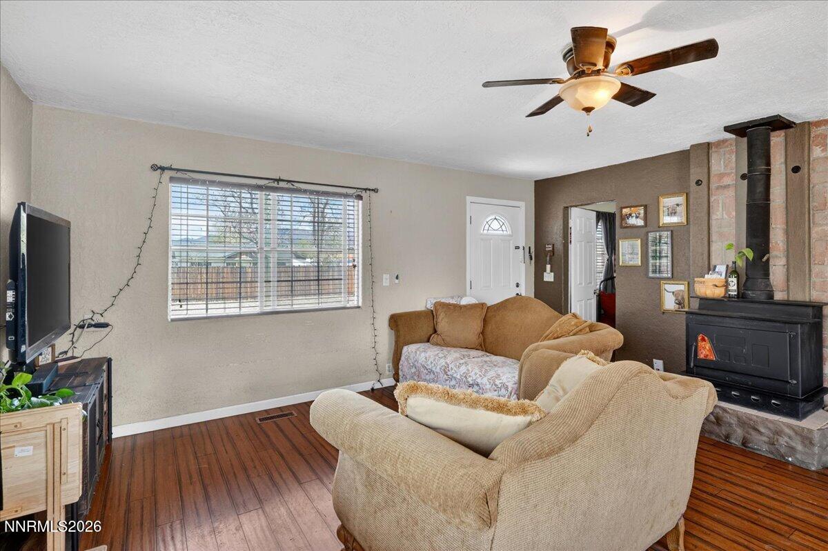 270 Vine Street Fernley, NV 89408 - Photo 16 of 28 a living room with furniture and a flat screen tv