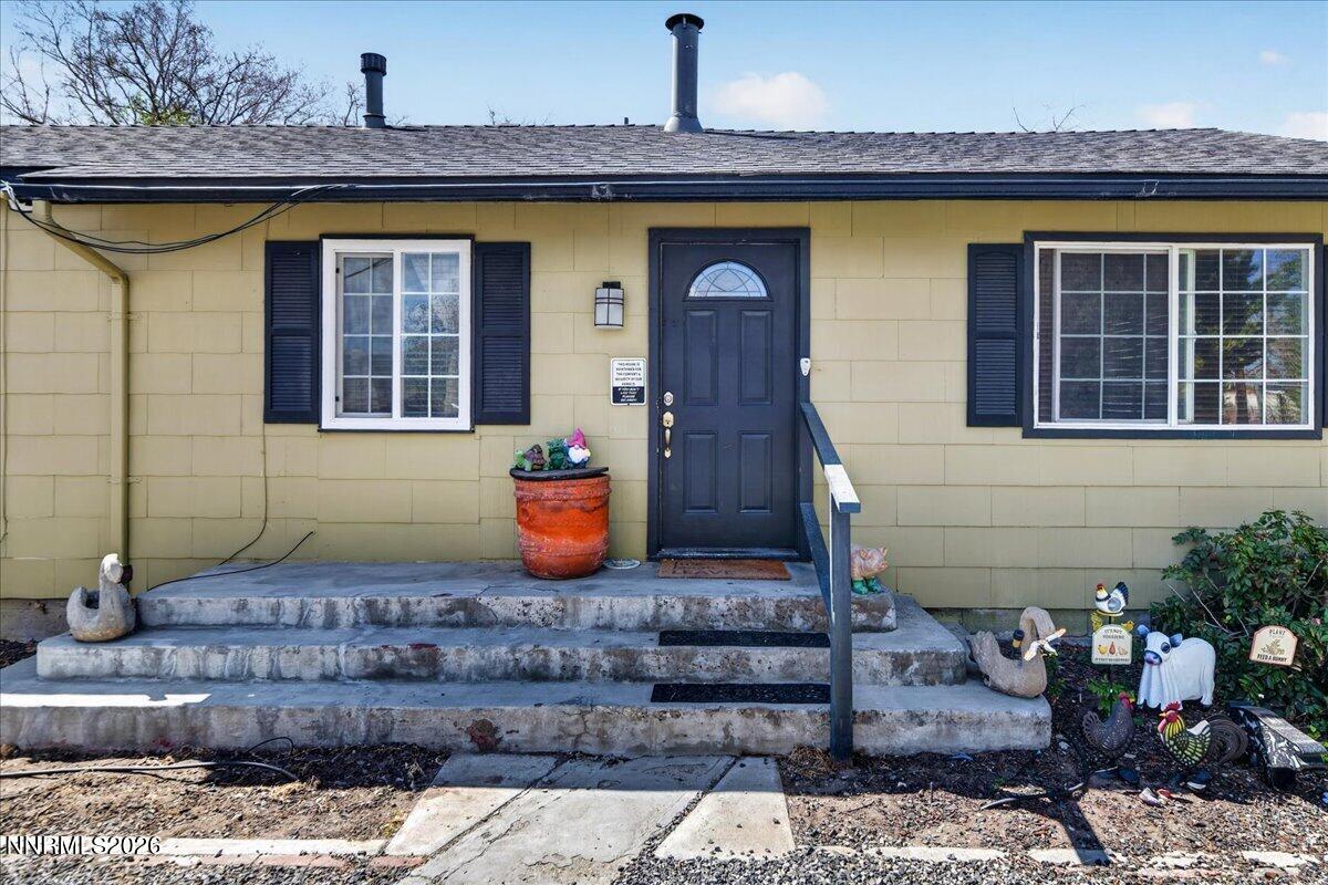 270 Vine Street Fernley, NV 89408 - Photo 5 of 28 a front view of a house with a yard