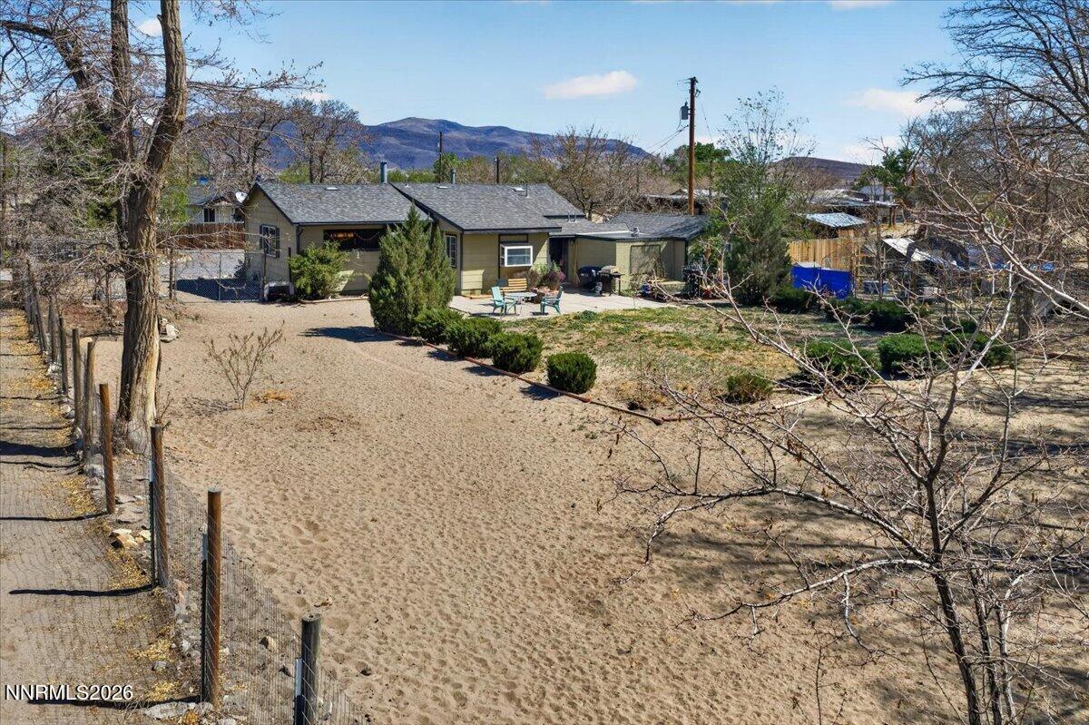 270 Vine Street Fernley, NV 89408 - Photo 7 of 28 a front view of a house with a yard