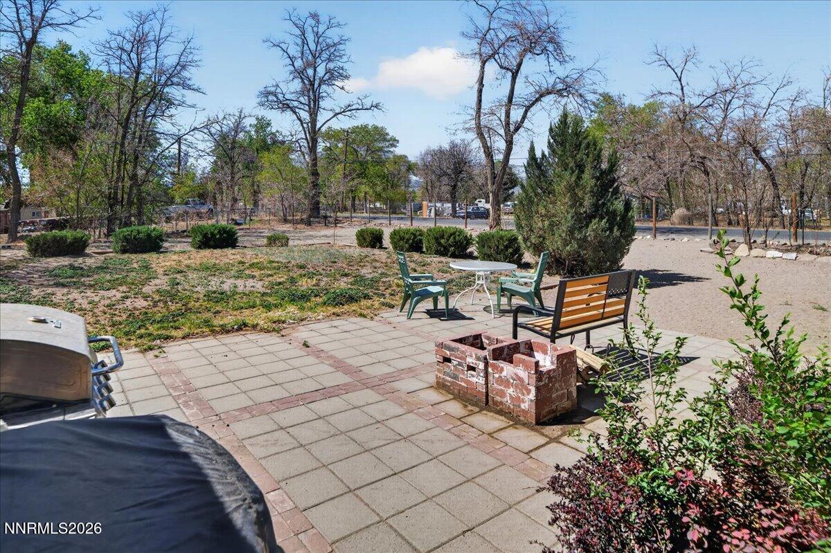 270 Vine Street Fernley, NV 89408 - Photo 10 of 28 a view of a backyard with sitting area