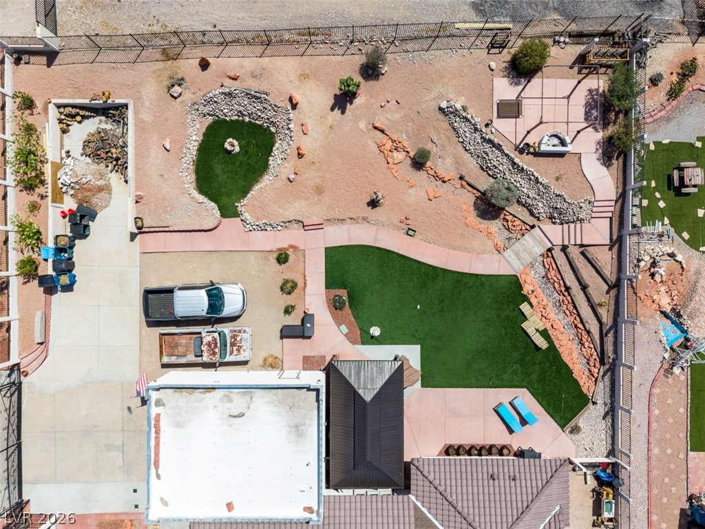 892 North Hollywood Boulevard Las Vegas, NV 89110 - Photo 71 of 81 An aerial view captures the outdoor living space, featuring various landscaped areas for relaxation and recreation.