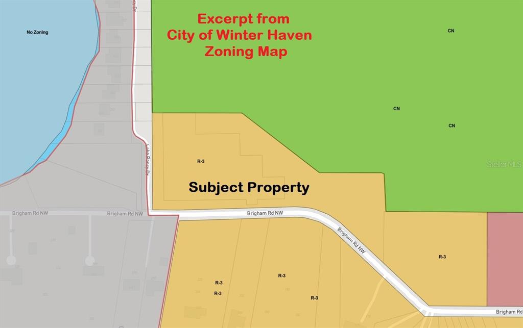 Brigham Road Winter Haven, FL 33881 - Photo 4 of 5 a view of a swimming pool with a book shelf