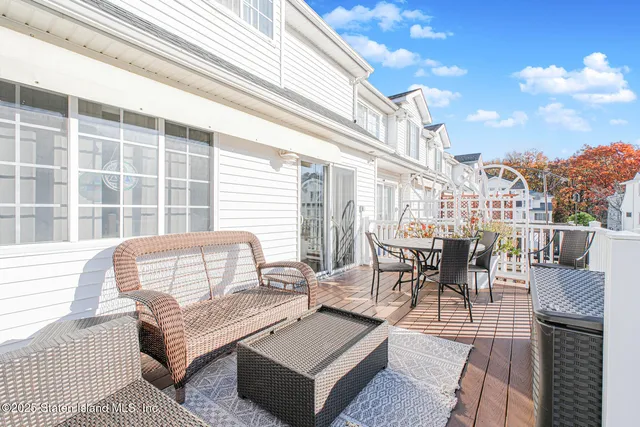 a building outdoor space with patio furniture