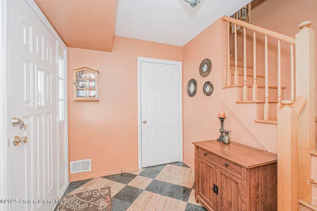 a bathroom with a sink a mirror and a shower