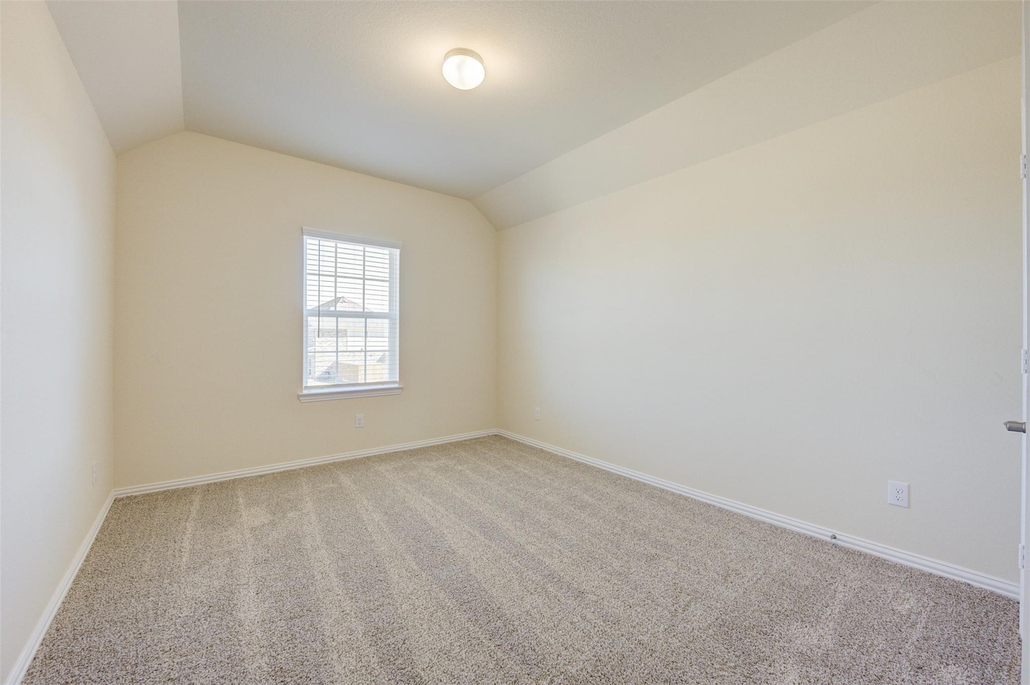10902 Granite Chief Drive Rosharon, TX 77583 - Photo 16 of 32 an empty room with a window