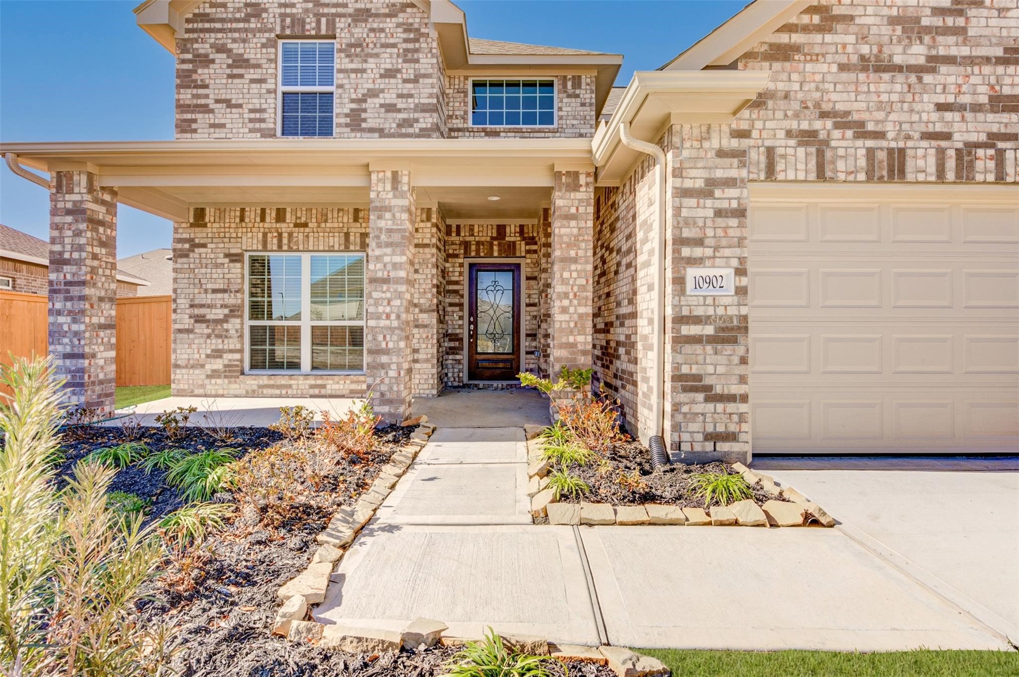 10902 Granite Chief Drive Rosharon, TX 77583 - Photo 3 of 32 a front view of a building