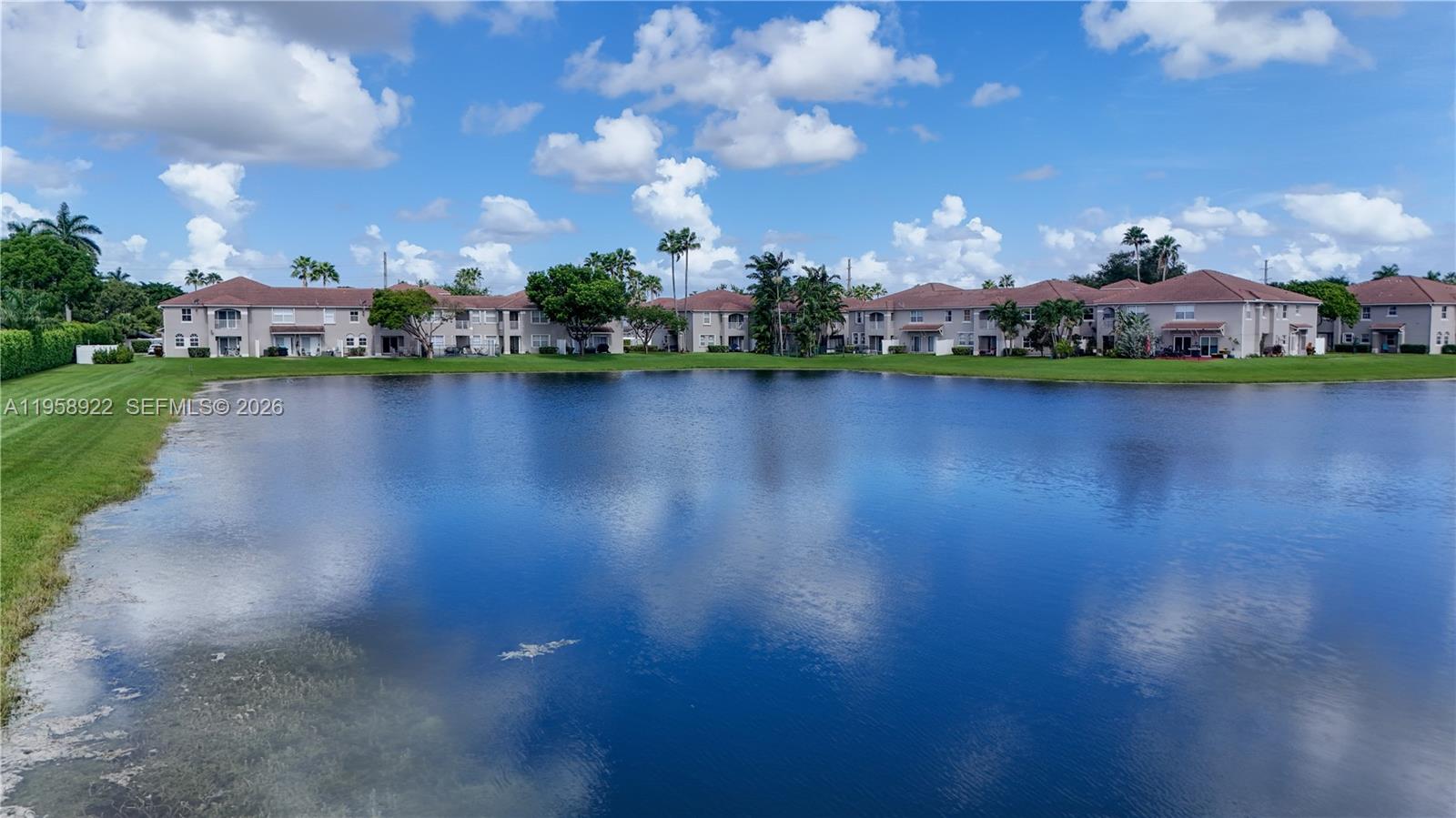 5467 Southwest 125th Terrace Miramar, FL 33027 - Photo 36 of 42 a view of a lake with houses