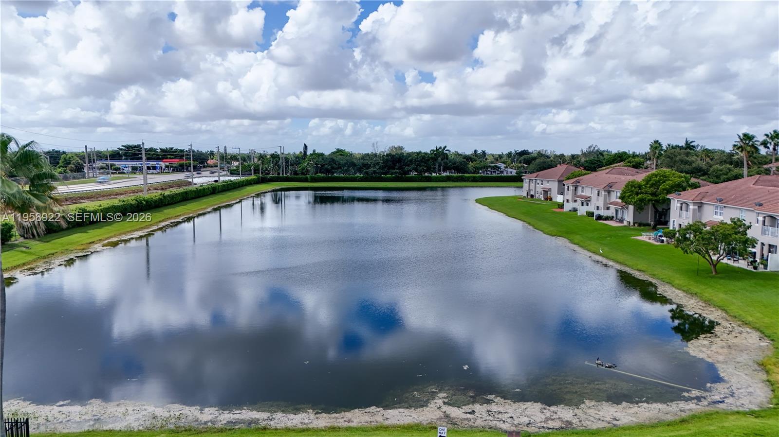 5467 Southwest 125th Terrace Miramar, FL 33027 - Photo 39 of 42 a view of a lake with a yard