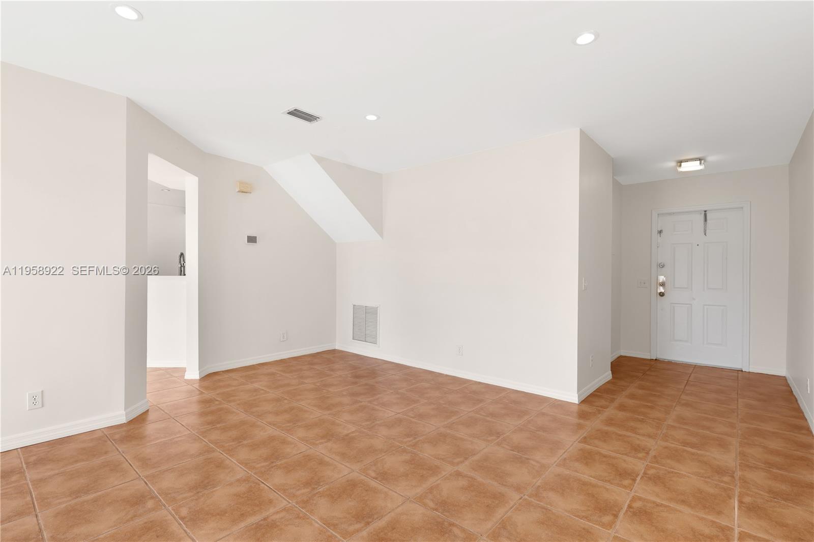 5467 Southwest 125th Terrace Miramar, FL 33027 - Photo 6 of 42 a view of an empty room