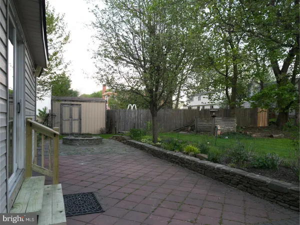 a view of a back yard of the house