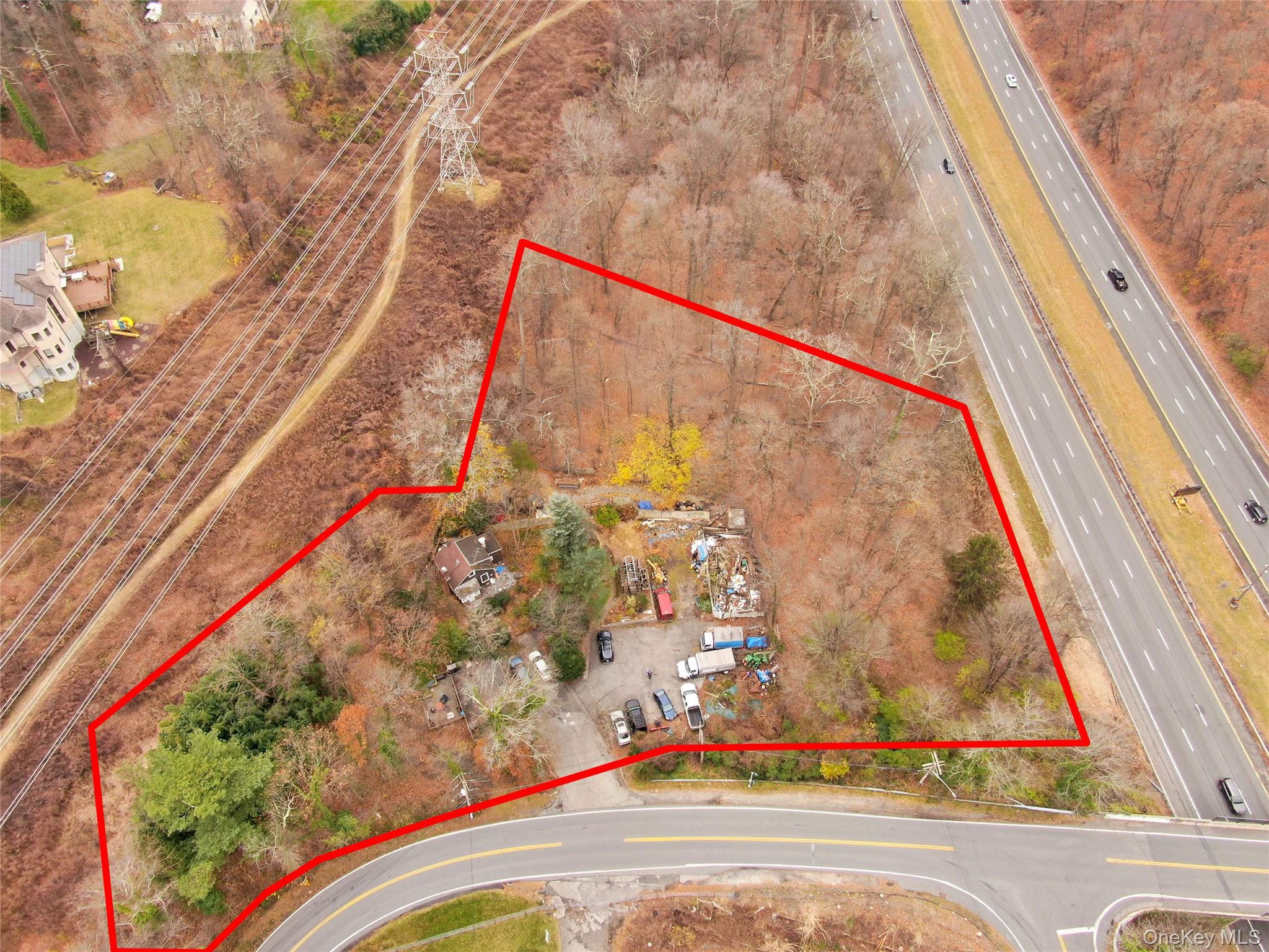 View of property location featuring a major roadway and property parcel outlined