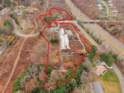 a view of swimming pool with a yard