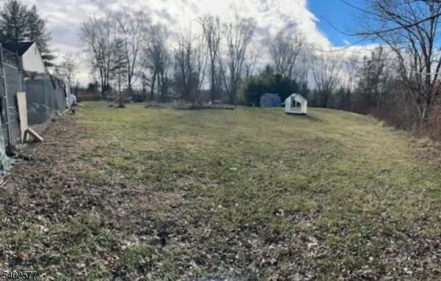 a view of a yard with a trees