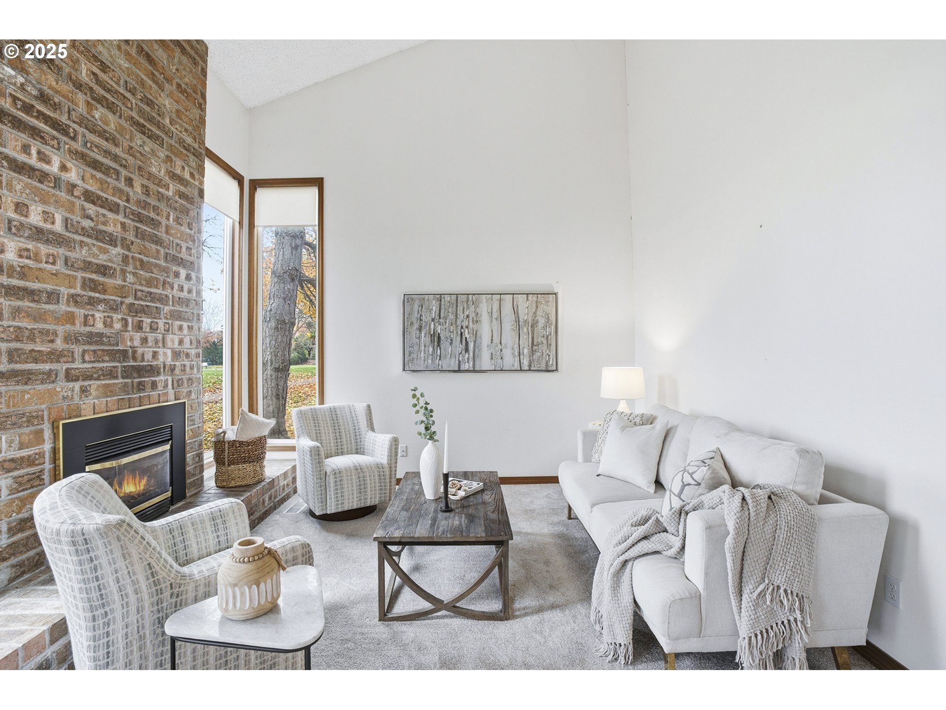 7430 Southwest Greens View Court Wilsonville, OR 97070 - Photo 13 of 48 a living room with furniture a fireplace and a flat screen tv