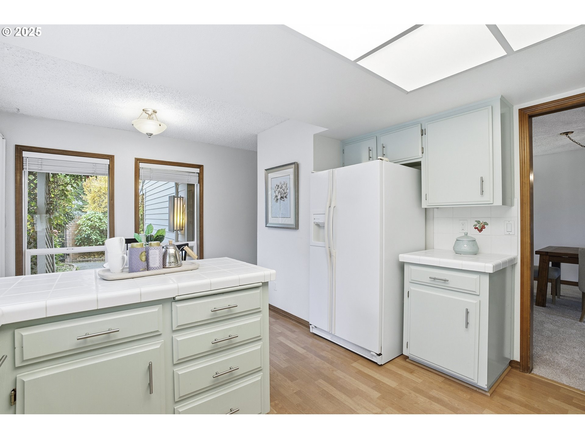 7430 Southwest Greens View Court Wilsonville, OR 97070 - Photo 19 of 48 a kitchen with a refrigerator and a sink