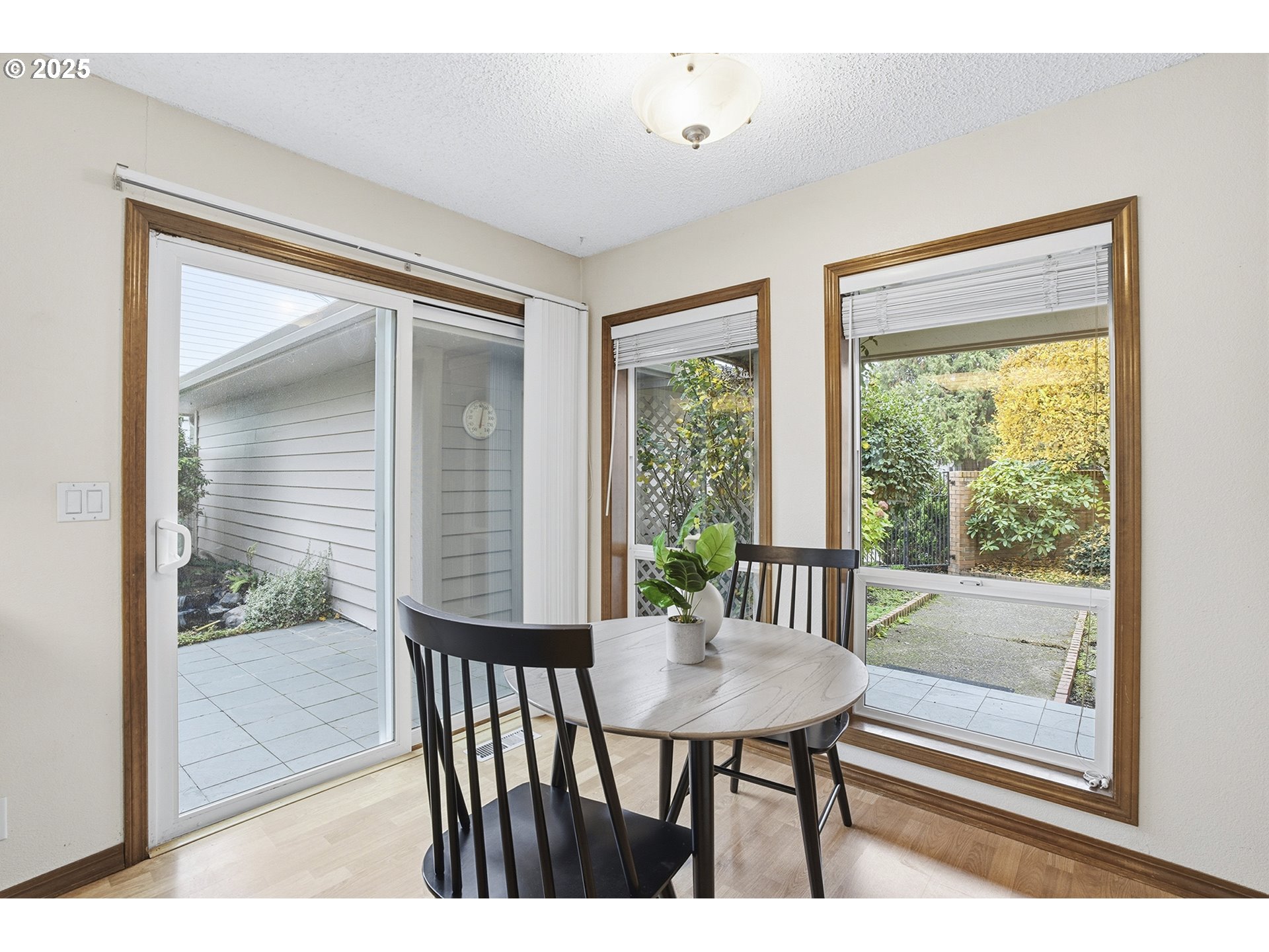 7430 Southwest Greens View Court Wilsonville, OR 97070 - Photo 20 of 48 a view of a room with a table and chairs
