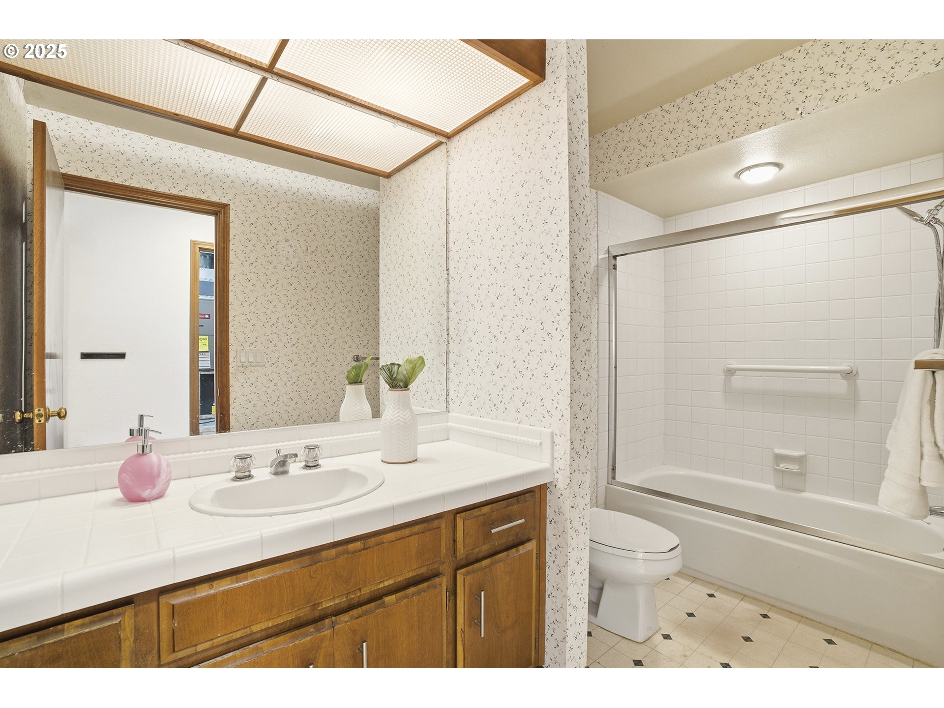 7430 Southwest Greens View Court Wilsonville, OR 97070 - Photo 23 of 48 a bathroom with a sink a toilet and shower
