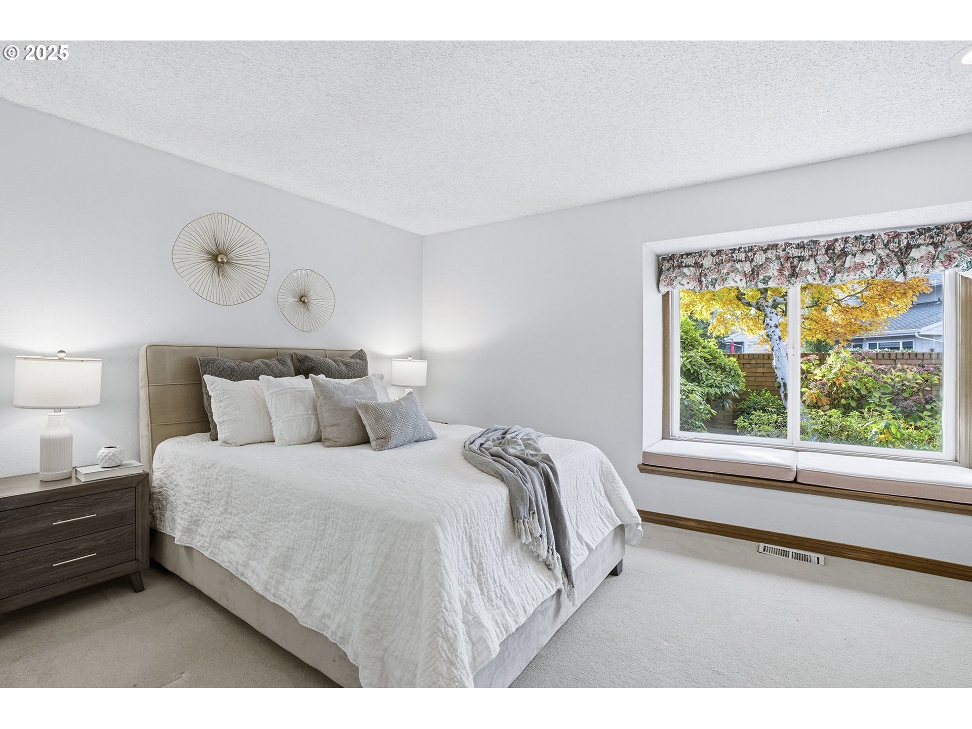 7430 Southwest Greens View Court Wilsonville, OR 97070 - Photo 24 of 48 a bedroom with a bed and a large window