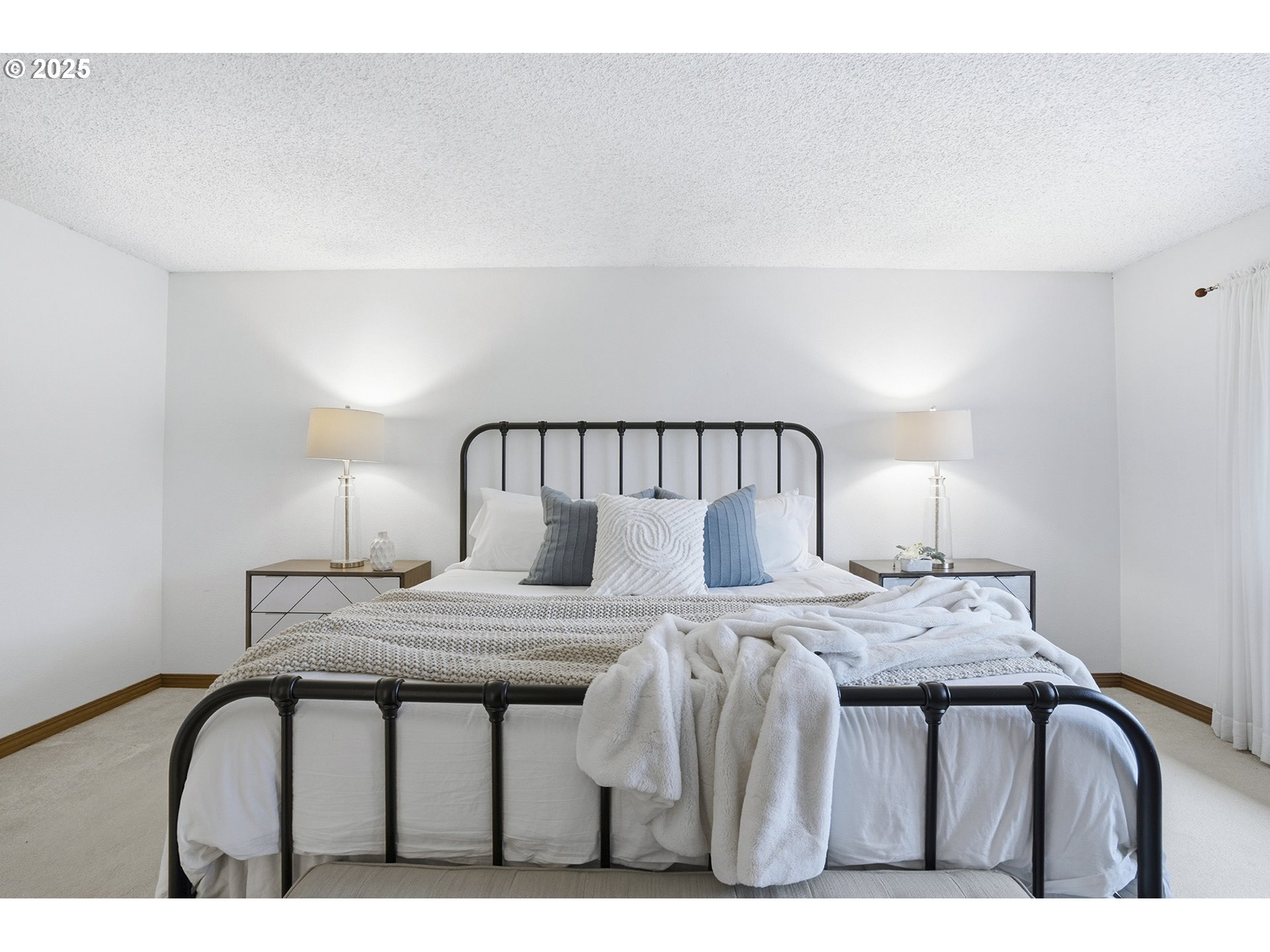 7430 Southwest Greens View Court Wilsonville, OR 97070 - Photo 29 of 48 a bedroom with a bed and lamp