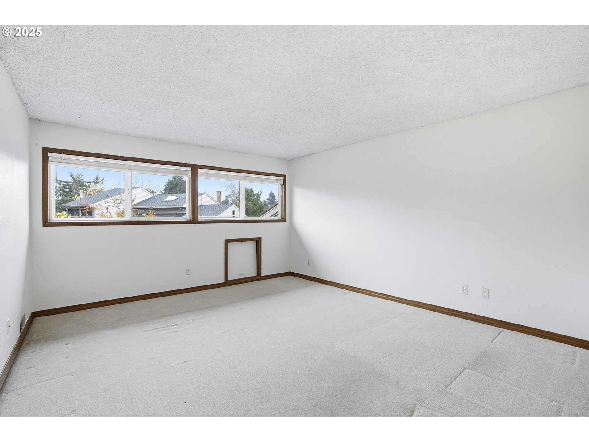 7430 Southwest Greens View Court Wilsonville, OR 97070 - Photo 37 of 48 a view of an empty room with a window