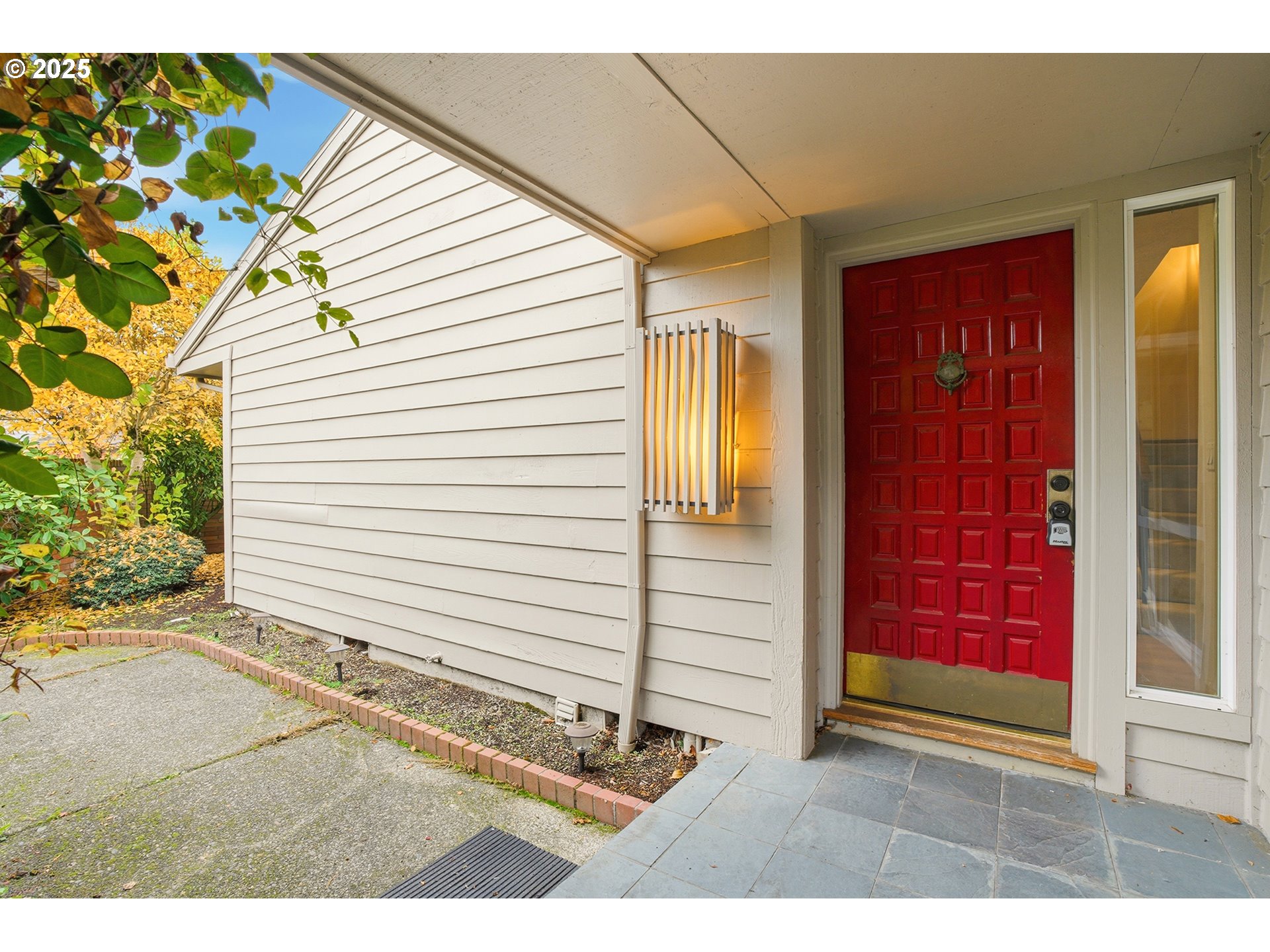 7430 Southwest Greens View Court Wilsonville, OR 97070 - Photo 4 of 48 a view of a house with a door and wooden floor