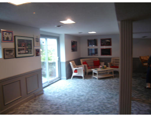 67 White Loaf Road Southampton, MA 01073 - Photo 3 of 10 a living room with furniture and a flat screen tv