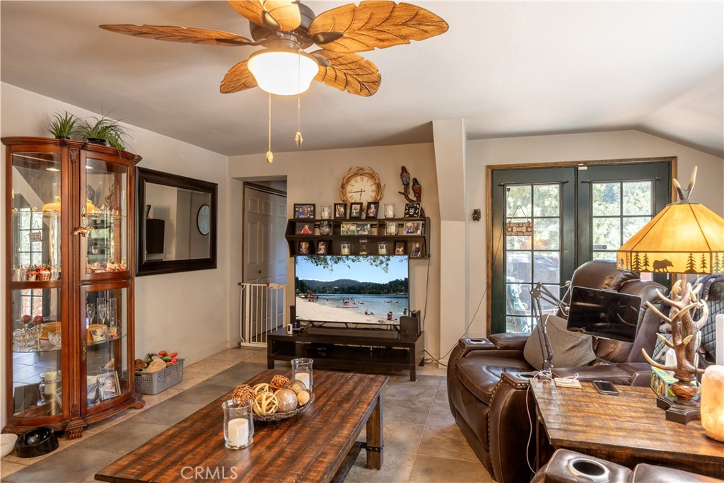519 South Dart Canyon Road Crestline, CA 92325 - Photo 11 of 26 a living room with furniture and a chandelier