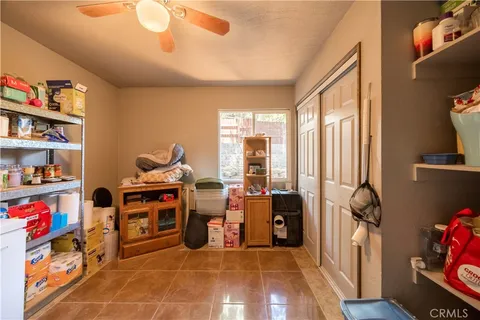 a bathroom with a toilet a sink and a mirror