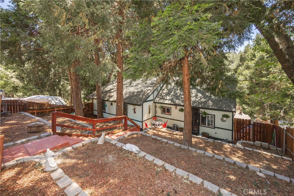 519 South Dart Canyon Road Crestline, CA 92325 - Photo 2 of 26 a street view with large trees