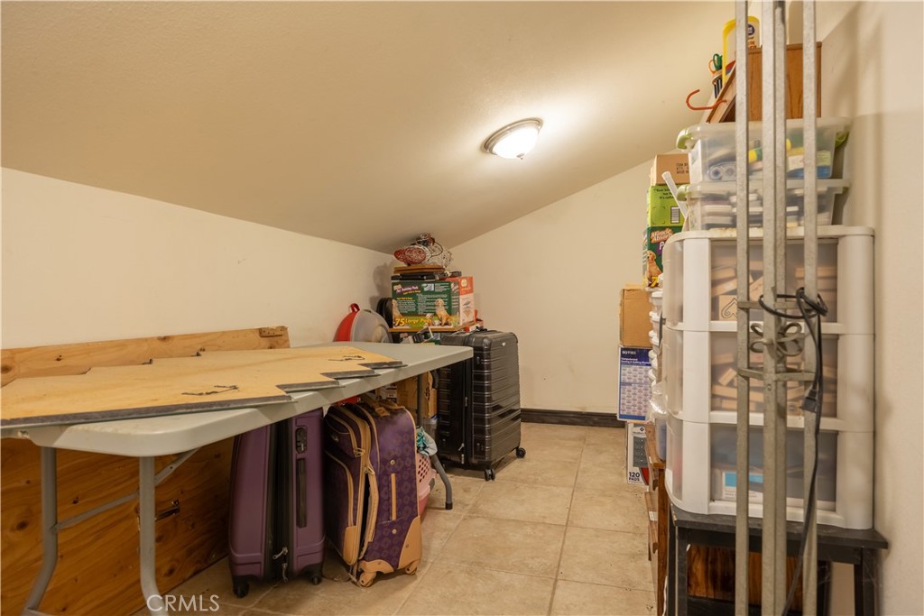519 South Dart Canyon Road Crestline, CA 92325 - Photo 22 of 26 a view of a kitchen with furniture and a kitchen