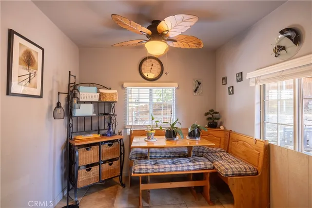 a kitchen with stainless steel appliances granite countertop a sink a stove and cabinets