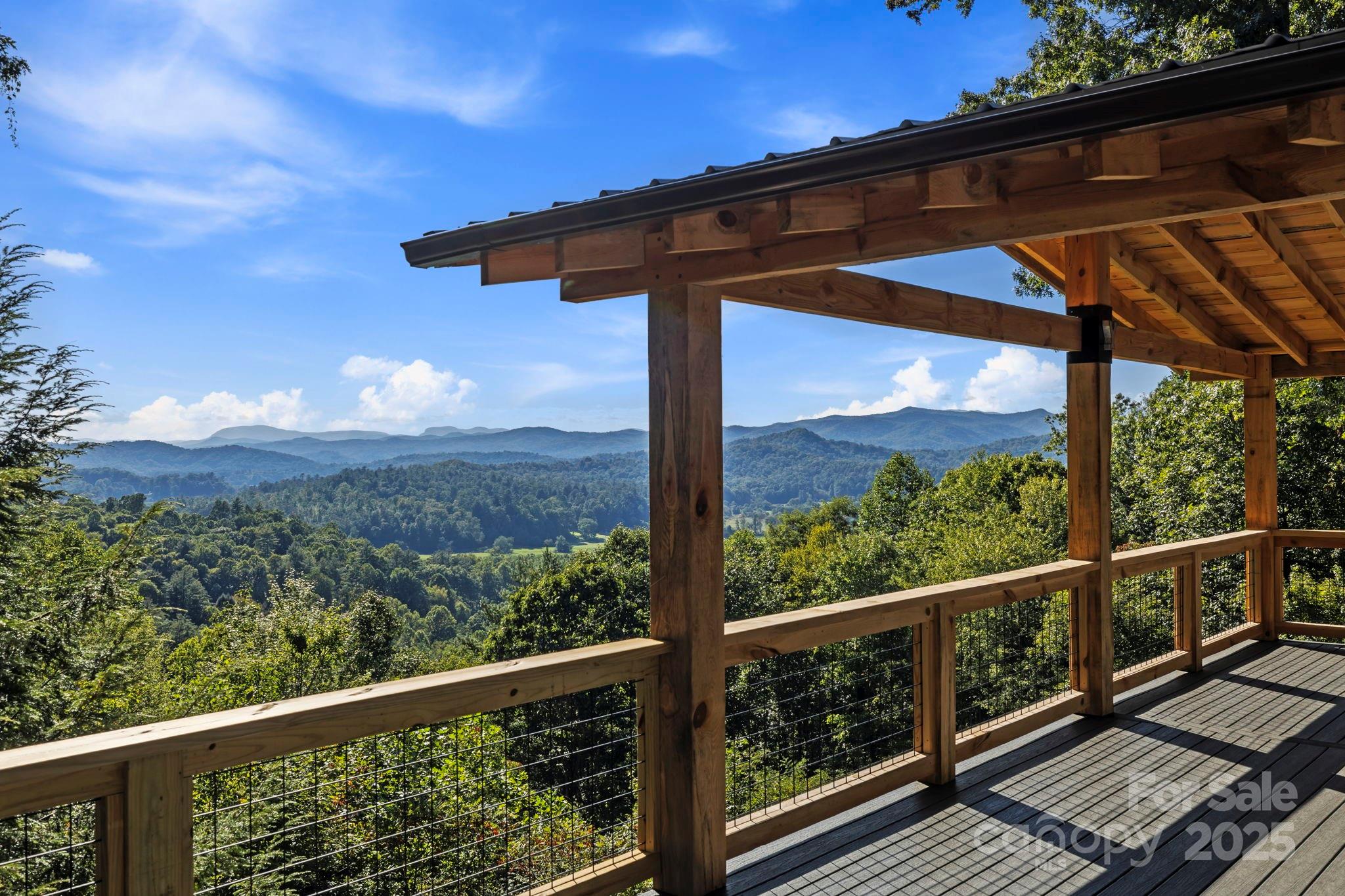 658 Johnson Road Brevard, NC 28712 - Photo 3 of 48 a view of a wooden bridge