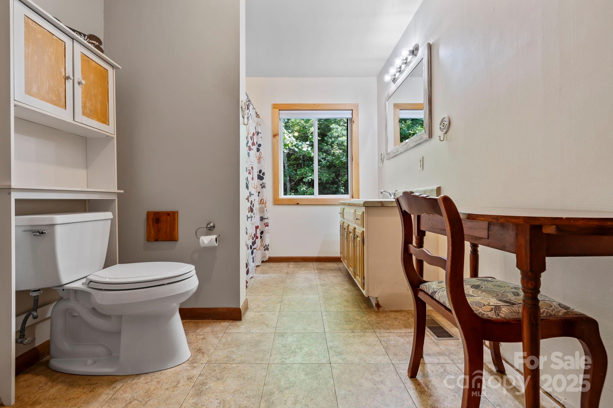 658 Johnson Road Brevard, NC 28712 - Photo 31 of 48 a view of a room with furniture and windows