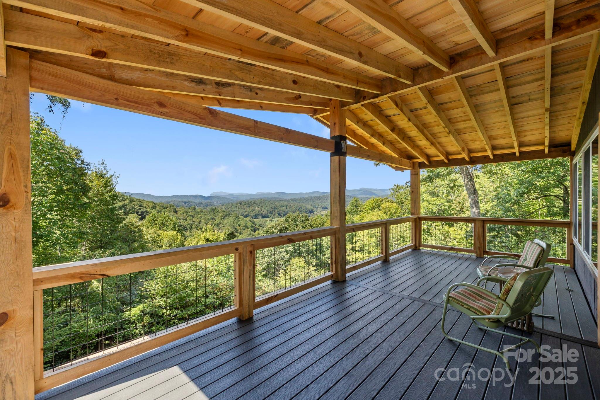 658 Johnson Road Brevard, NC 28712 - Photo 35 of 48 a view of two chairs in the balcony