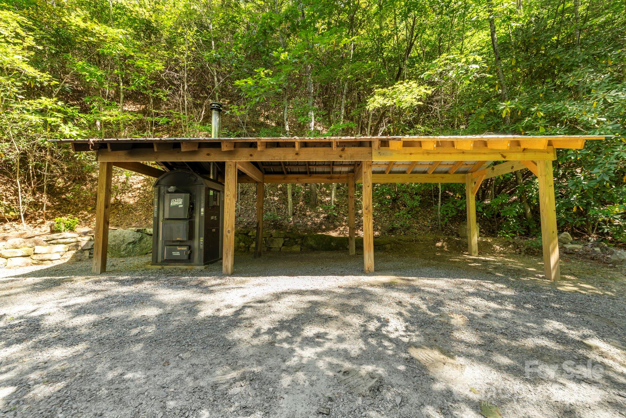 658 Johnson Road Brevard, NC 28712 - Photo 39 of 48 an outdoor view of house with green space