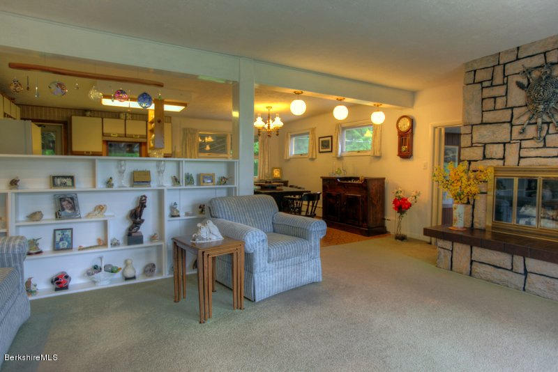 195 Main Road Monterey, MA 01245 - Photo 26 of 30 a living room with furniture and a fireplace