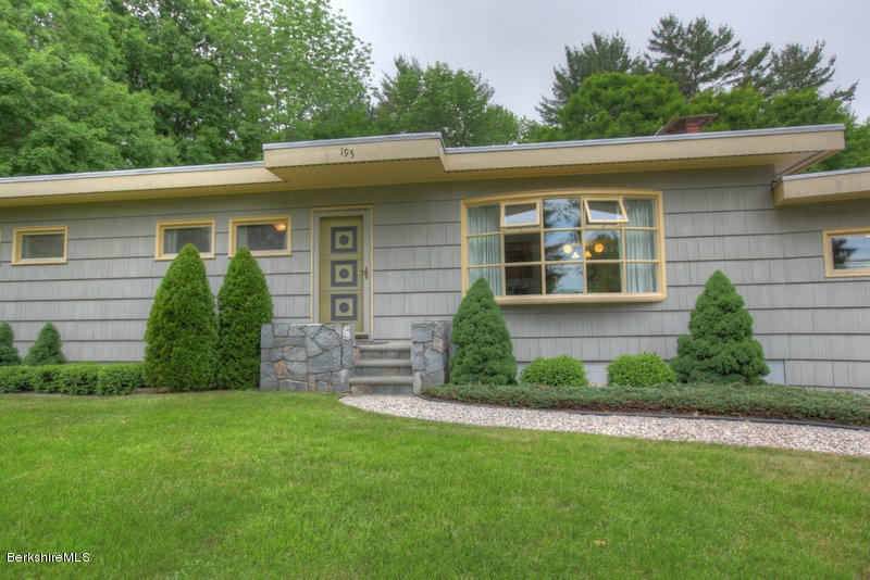195 Main Road Monterey, MA 01245 - Photo 7 of 30 a view of a house with a yard