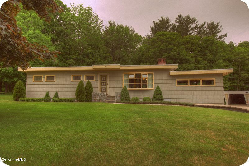 195 Main Road Monterey, MA 01245 - Photo 8 of 30 a front view of a house with a garden