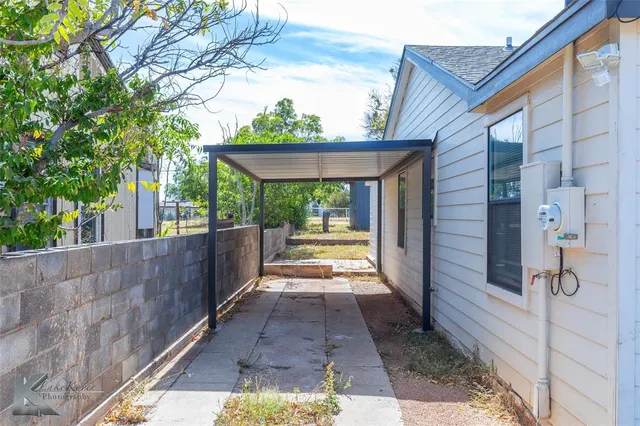a house with trees in front of it