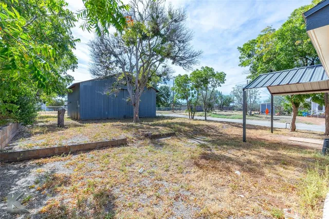 a house with trees in front of it