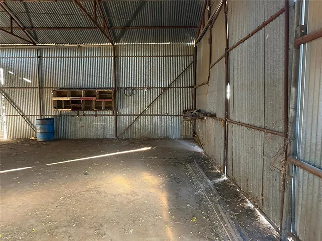 a view of backyard of house