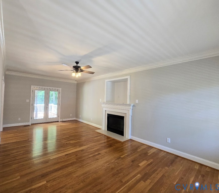 16406 Benmore Road Moseley, VA 23120 - Photo 10 of 32 a view of an empty room with window and wooden floor