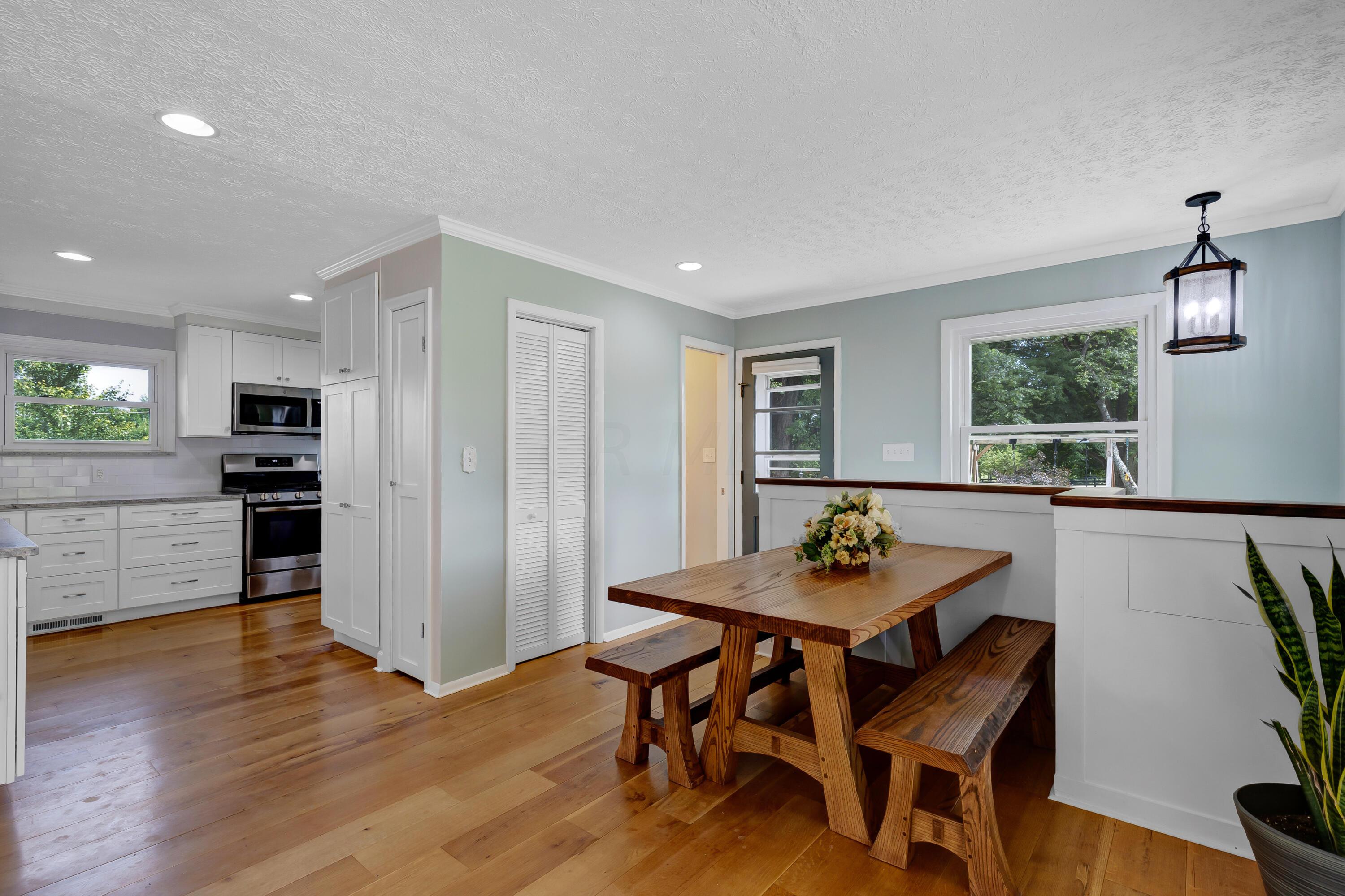 3324 Sunbury Road Galena, OH 43021 - Photo 13 of 56 • 11’11 x 13’9 • New White Oak Flooring ~ 2014/2015 • Sage Painted Walls • Crown Molding • Can Lighting • Pantry Closet • Double Sliding Doors & Paver Patio