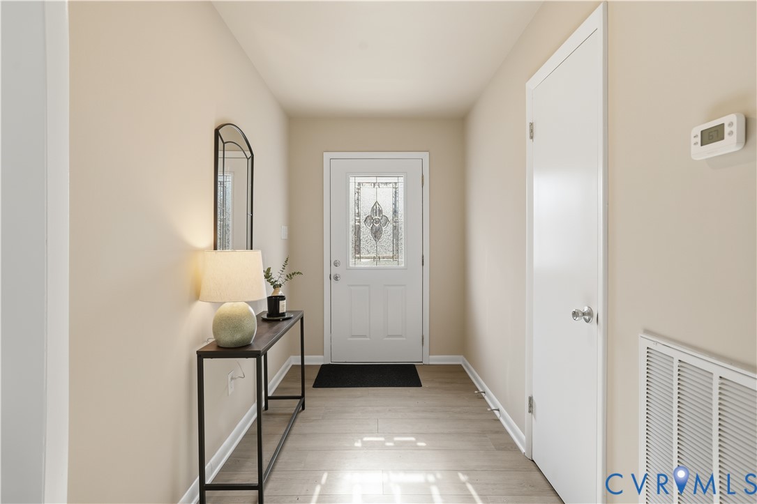 4400 Treely Road Chester, VA 23831 - Photo 22 of 34 a view of an entryway with wooden floor
