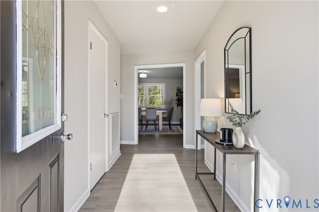 4400 Treely Road Chester, VA 23831 - Photo 24 of 34 a walk in closet with wooden floor