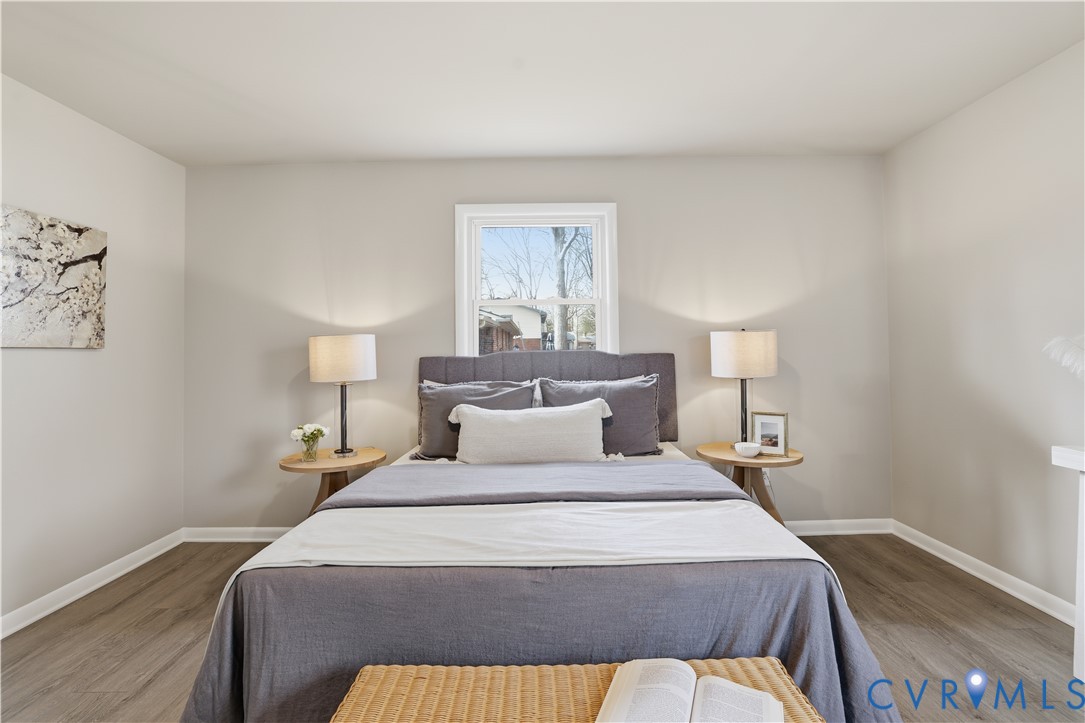 4400 Treely Road Chester, VA 23831 - Photo 29 of 34 a bedroom with a bed and lamp
