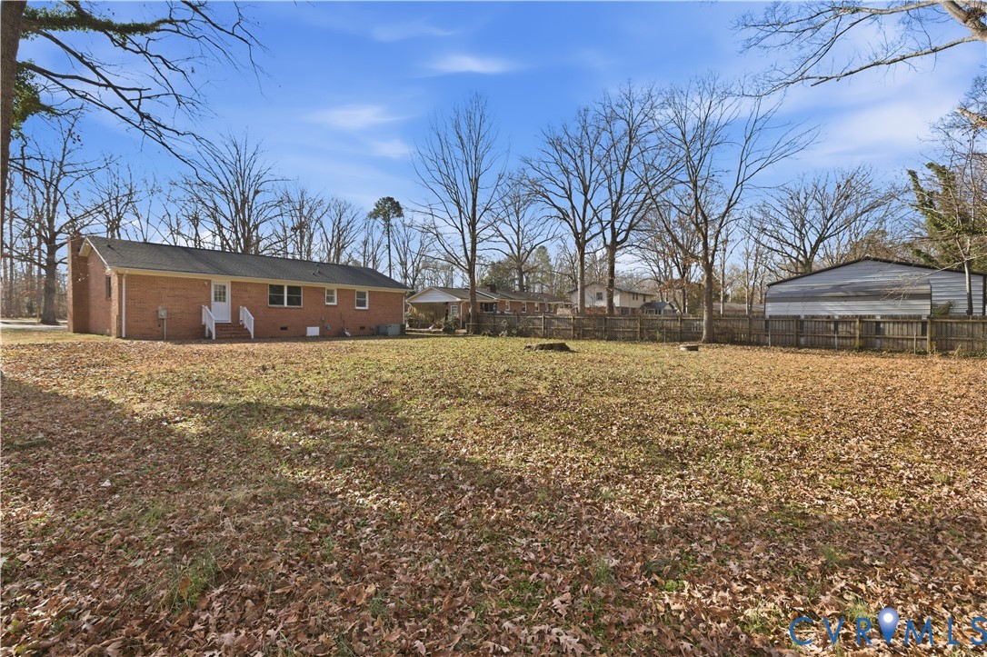 4400 Treely Road Chester, VA 23831 - Photo 5 of 34 a view of a yard with a house