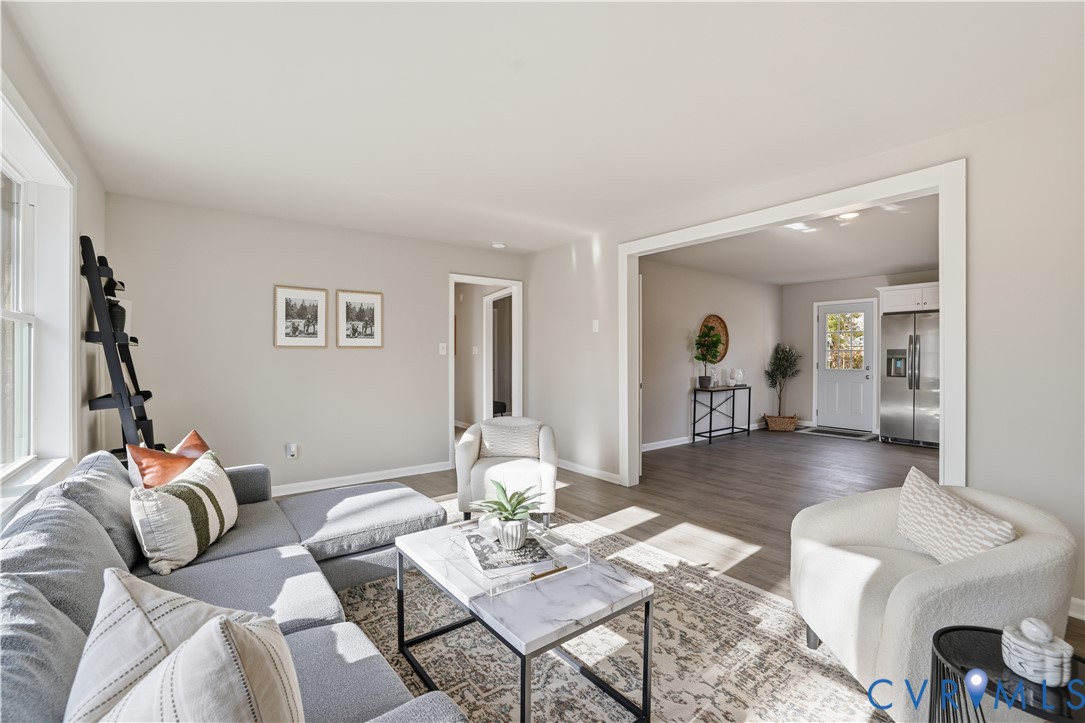 4400 Treely Road Chester, VA 23831 - Photo 9 of 34 a living room with furniture and a wooden floor